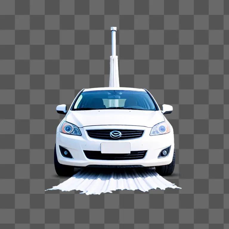 A car is washed with a white cloth on a grey background