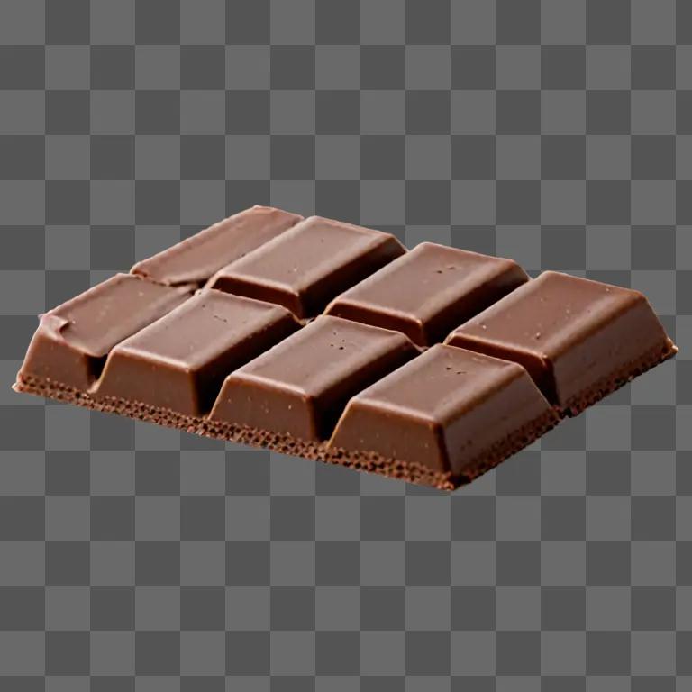 A chocolate bar on a brown background