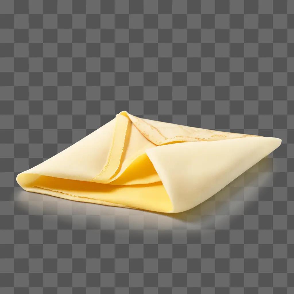 Crepes are folded in a square shape on a beige background