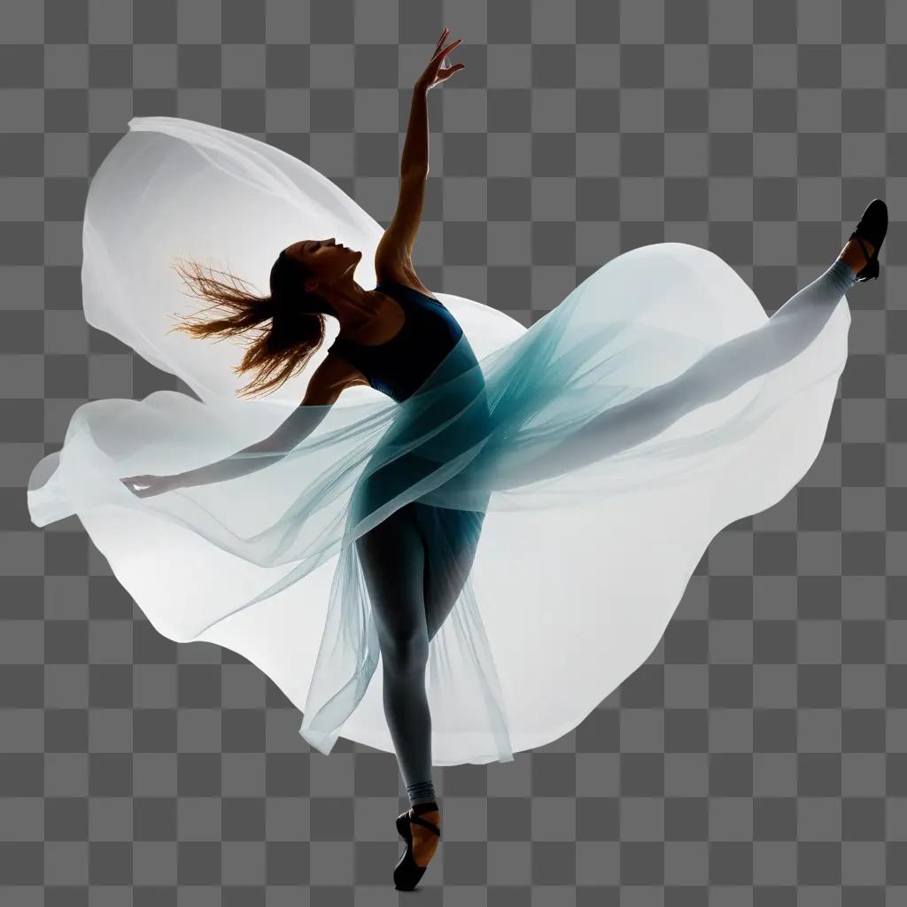 Dancer in a transparent dress dances with her legs extended