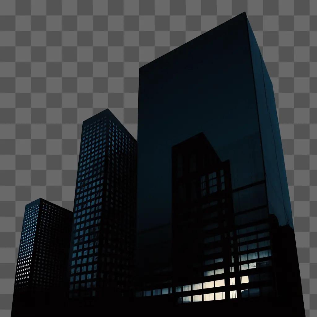 Dark cityscape at night with large buildings