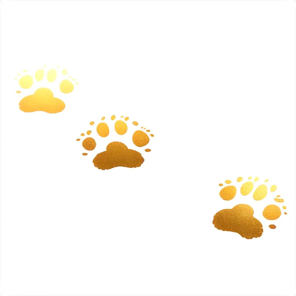 Dog paw prints in gold on white