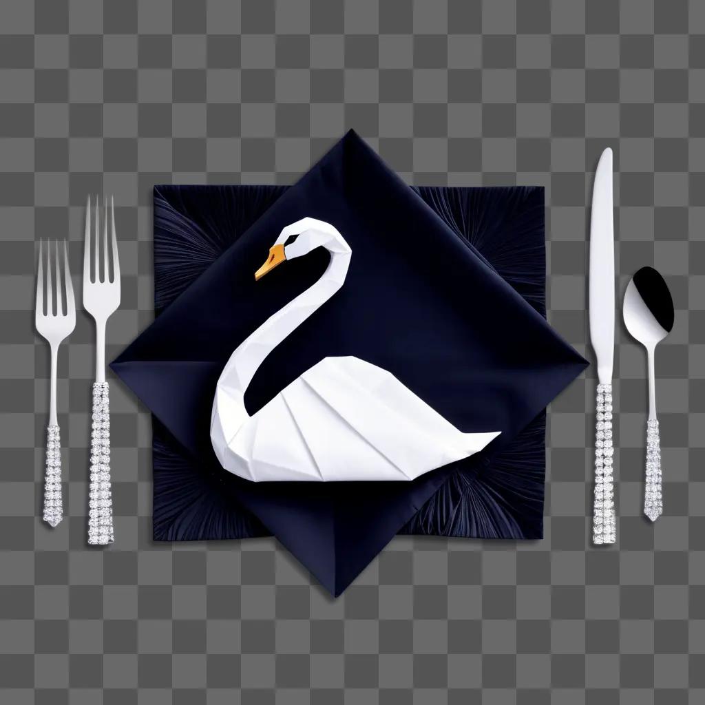 Fancy napkin with swan and fork, knife, spoon, and glass