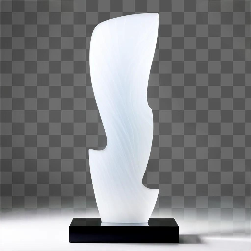 Frosted glass sculpture against white background