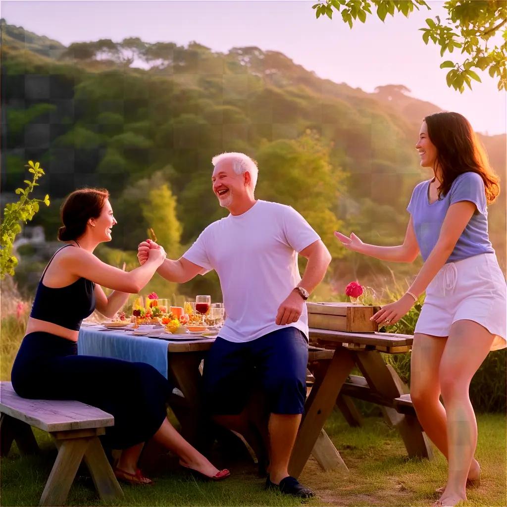 Happy man with women at picnic