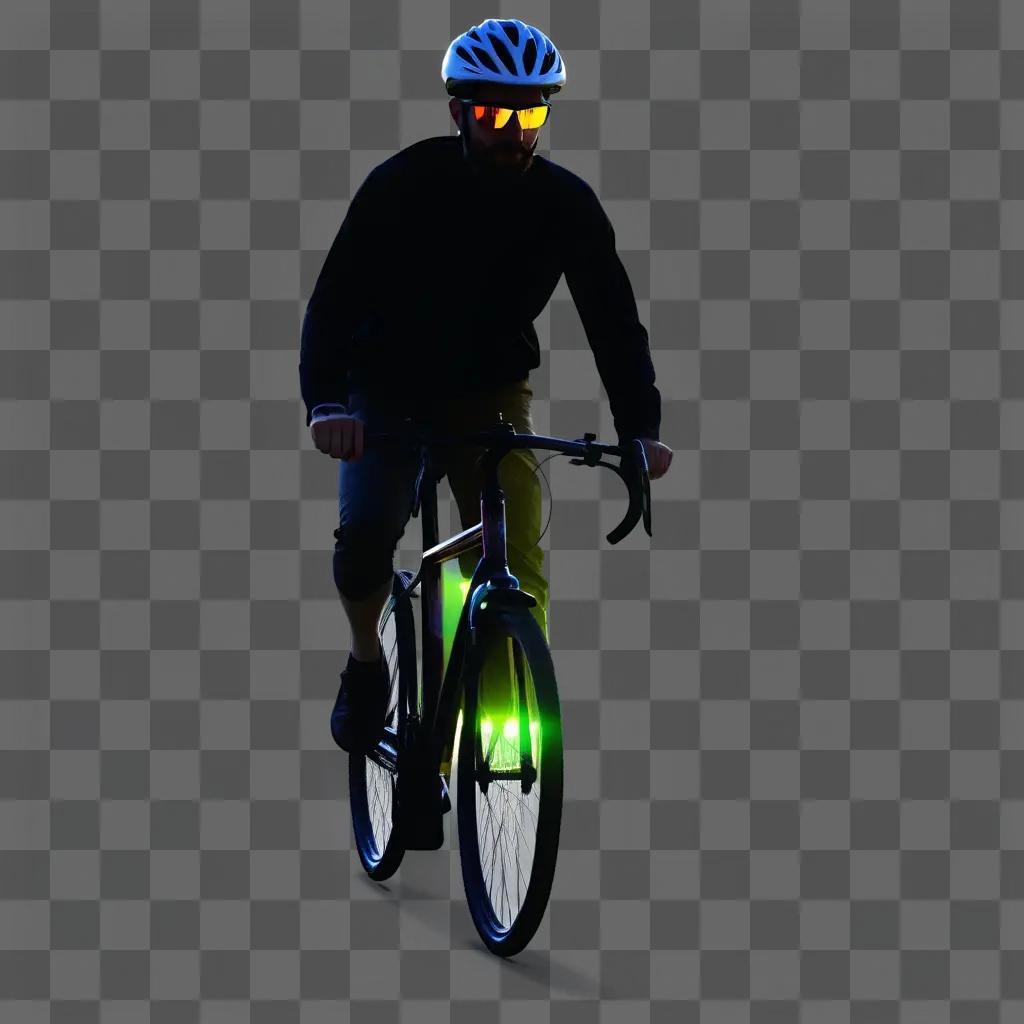 ヘルメットをかぶった男が光るライトで暗い自転車に乗る