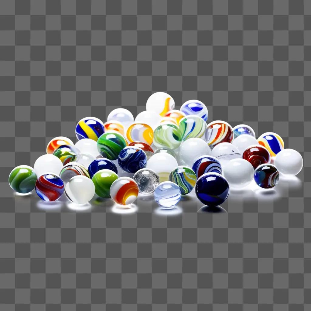 Marbles of various colors and designs sit on a gray surface