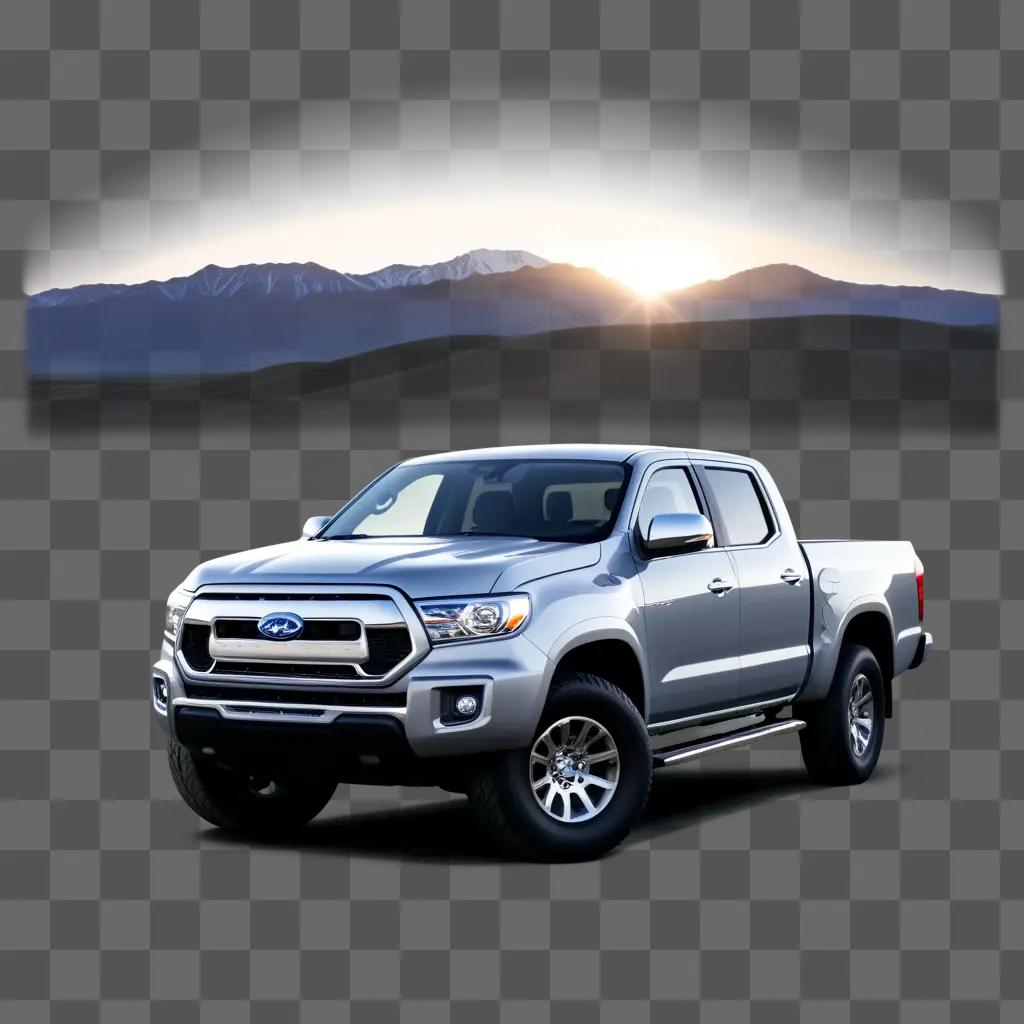 Silver truck on a road with mountains in the background