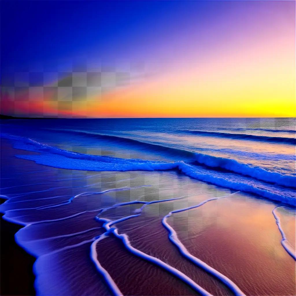 Sunrise on the beach with colorful clouds and waves