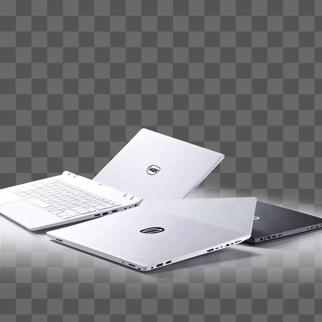 Three laptops with the Dell logo on them