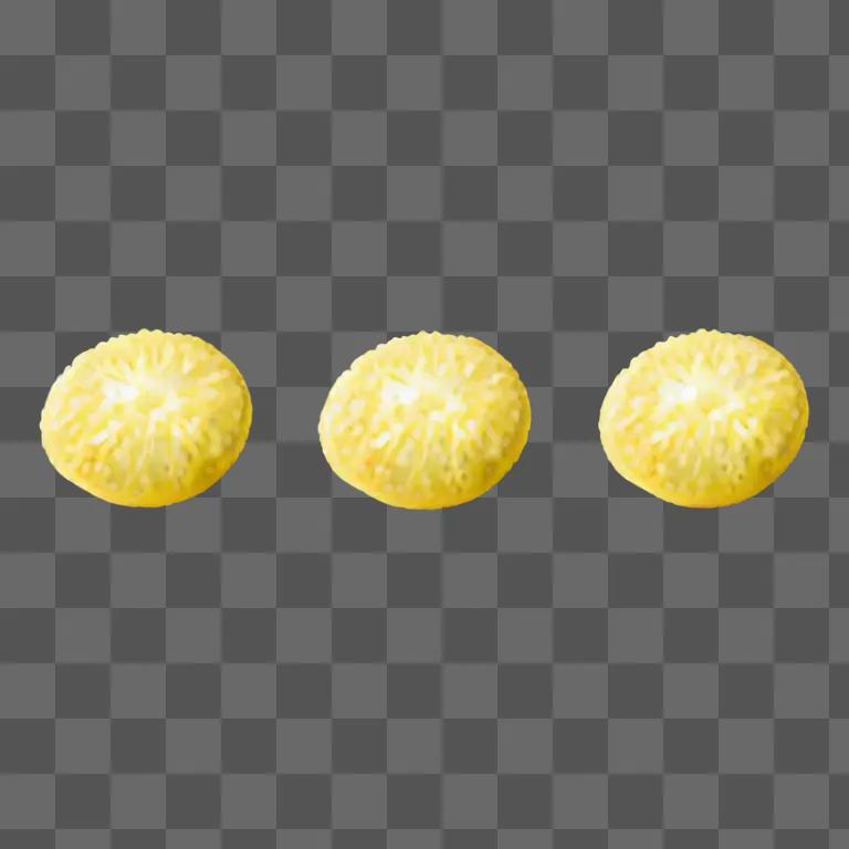 Three yellow fruits on a yellow background