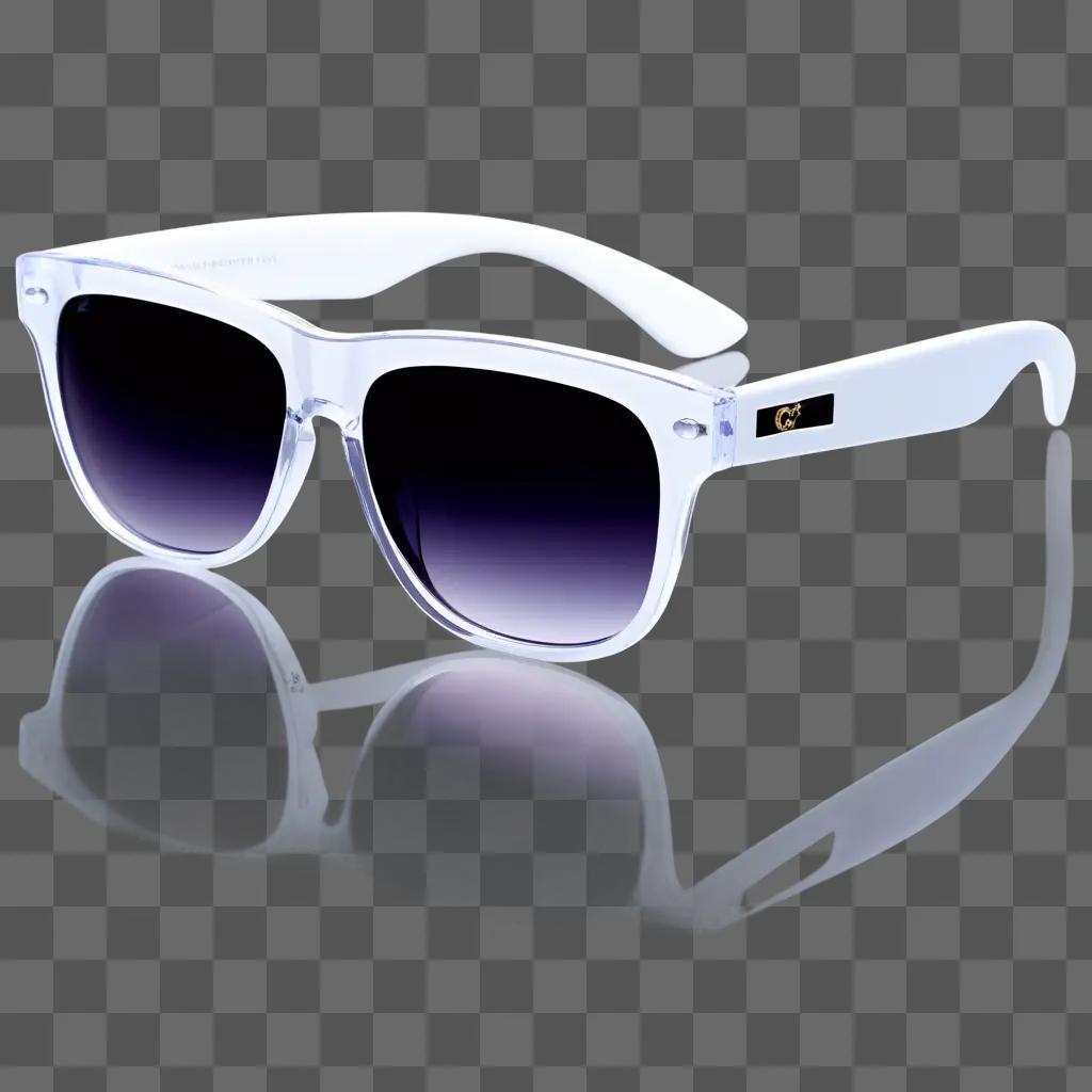 Transparent sunglasses with gold logo on the side