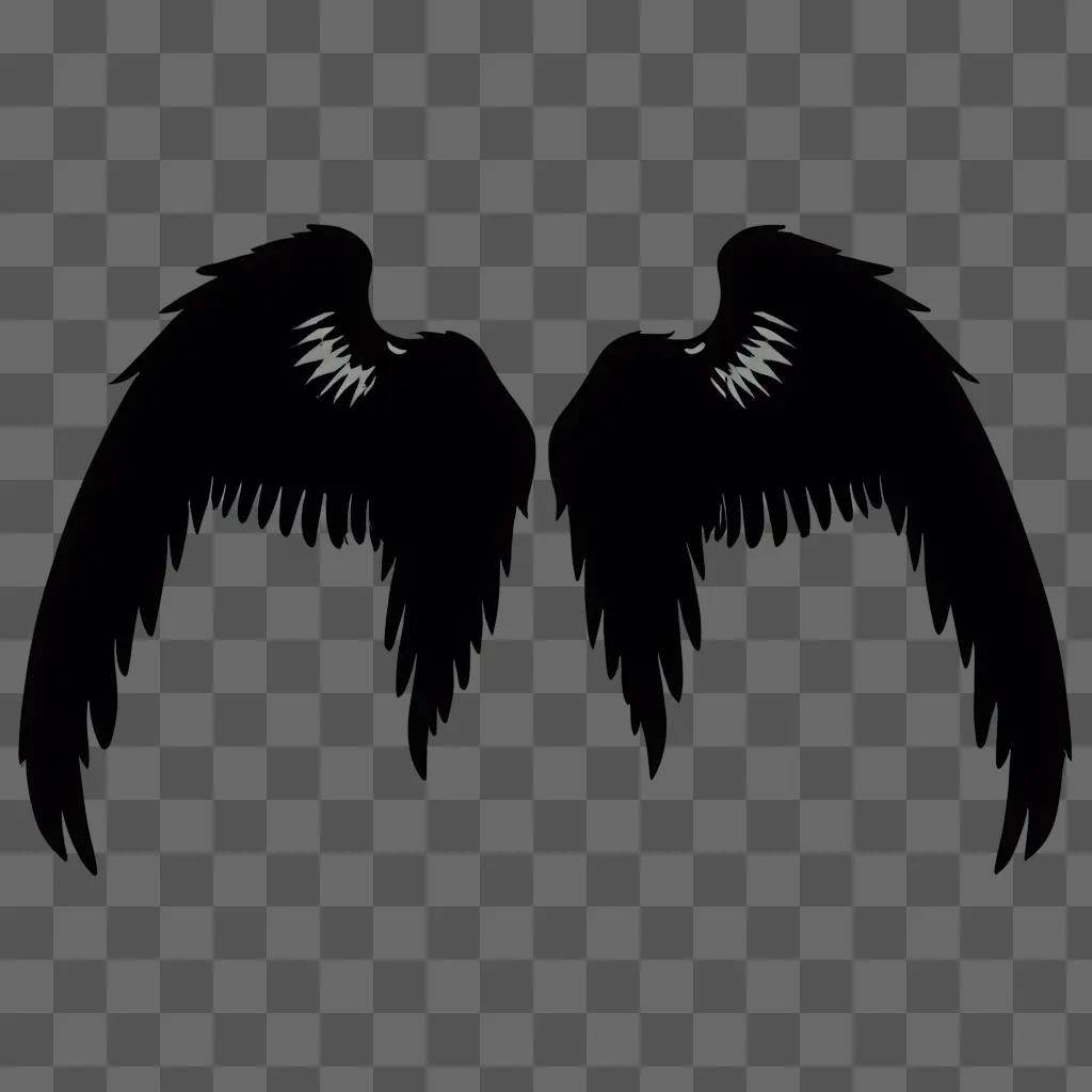 Two dark angel wings silhouetted in black