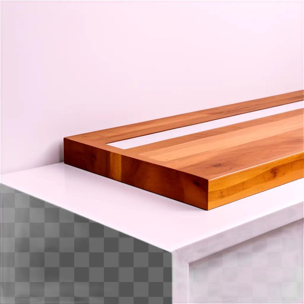 Wooden counter with a white trim on a white wall