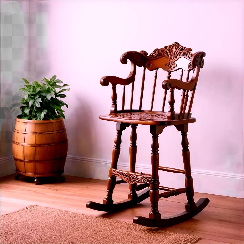 Wooden rocking chair with a green plant next to it