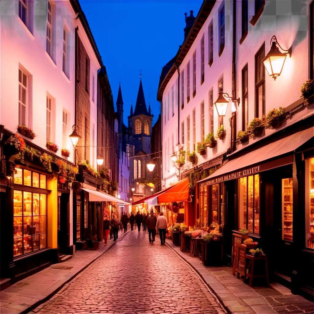 cobblestone street at dusk with people walking