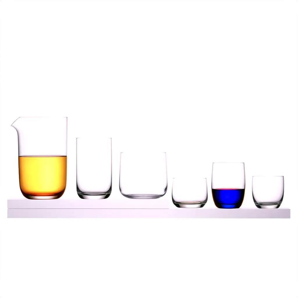 collection of glassware on a white shelf