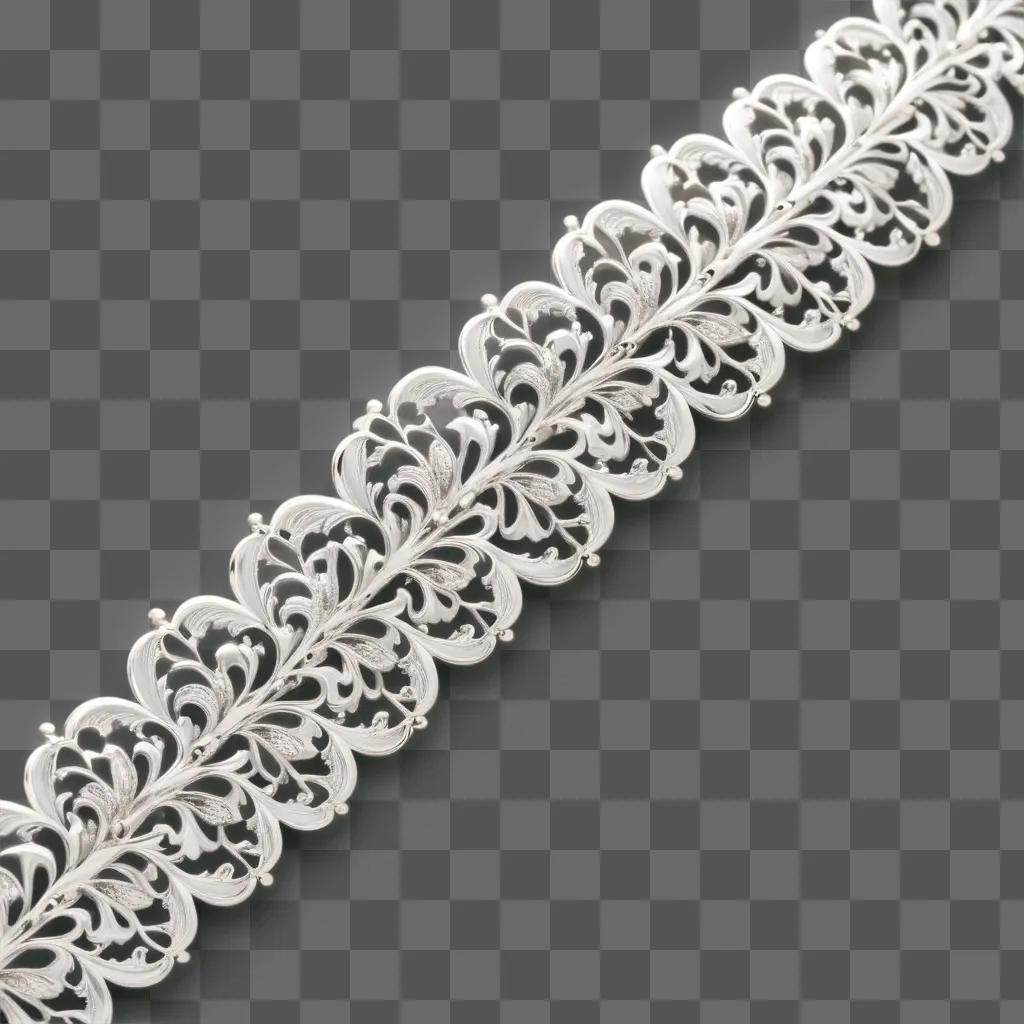 filigree bracelet sits on a gray surface