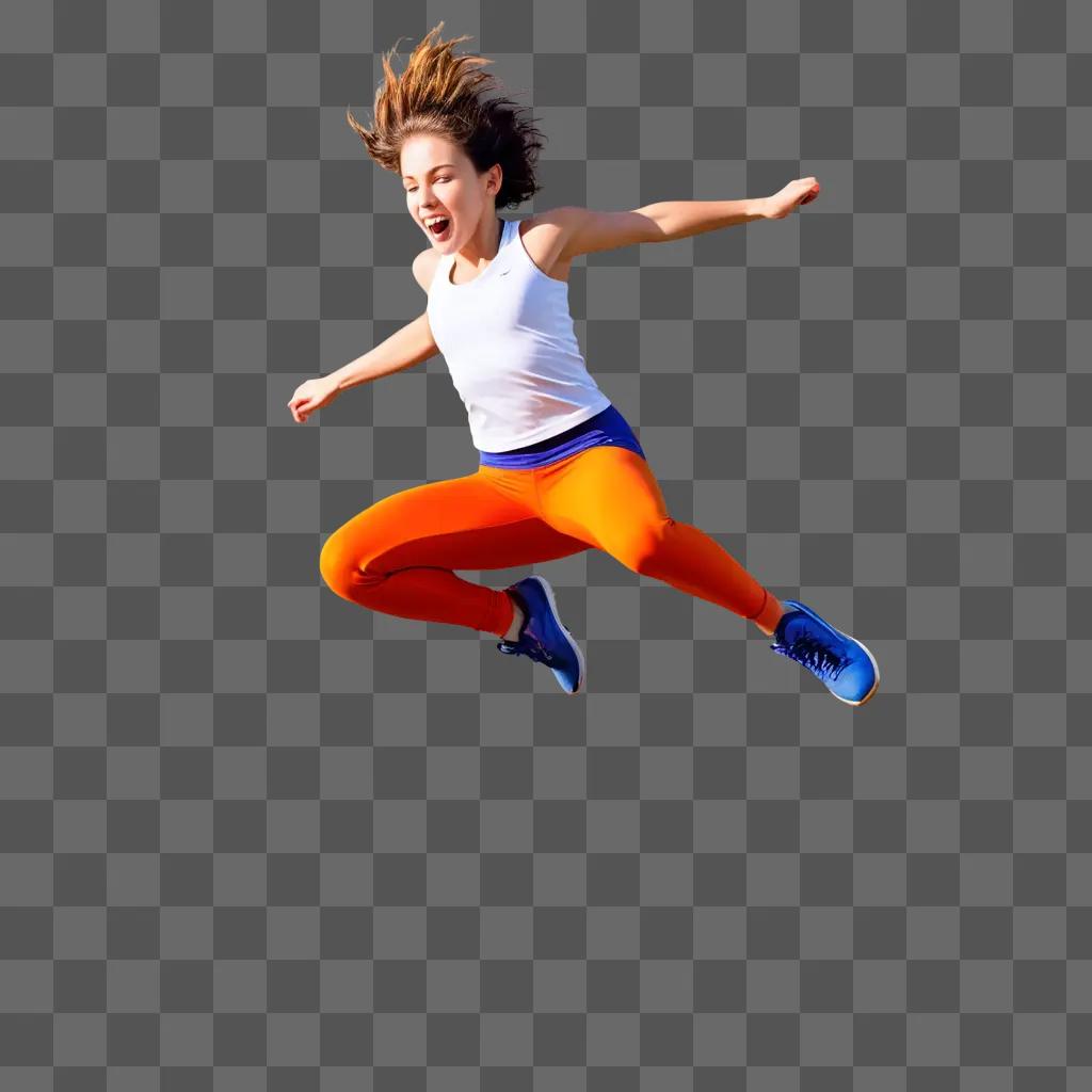 girl in a white top and orange pants jumps