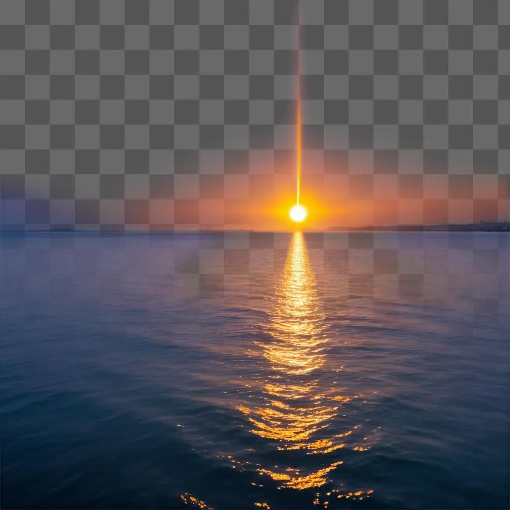 lens flare illuminates a sunset over water