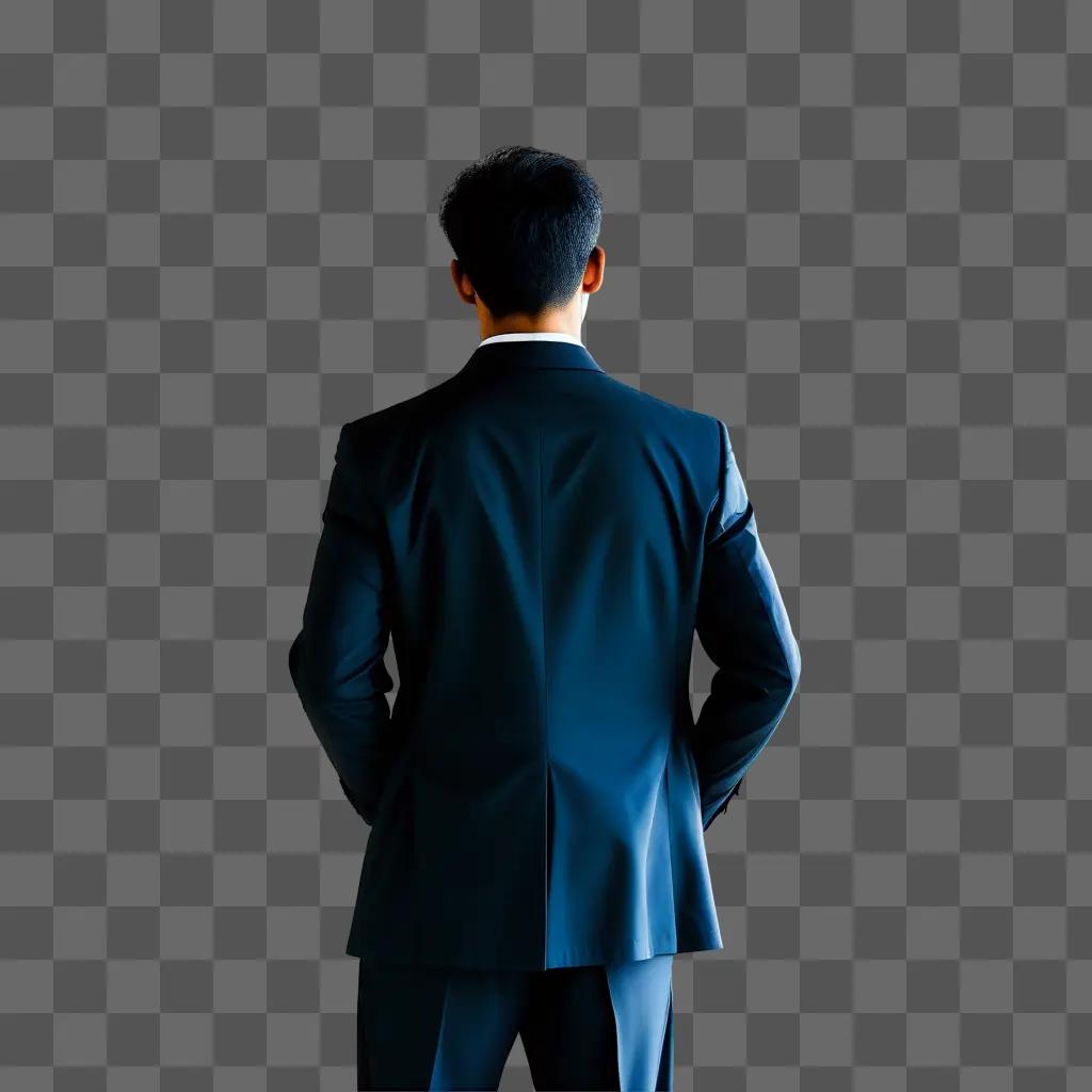 man in a suit is focused on his back