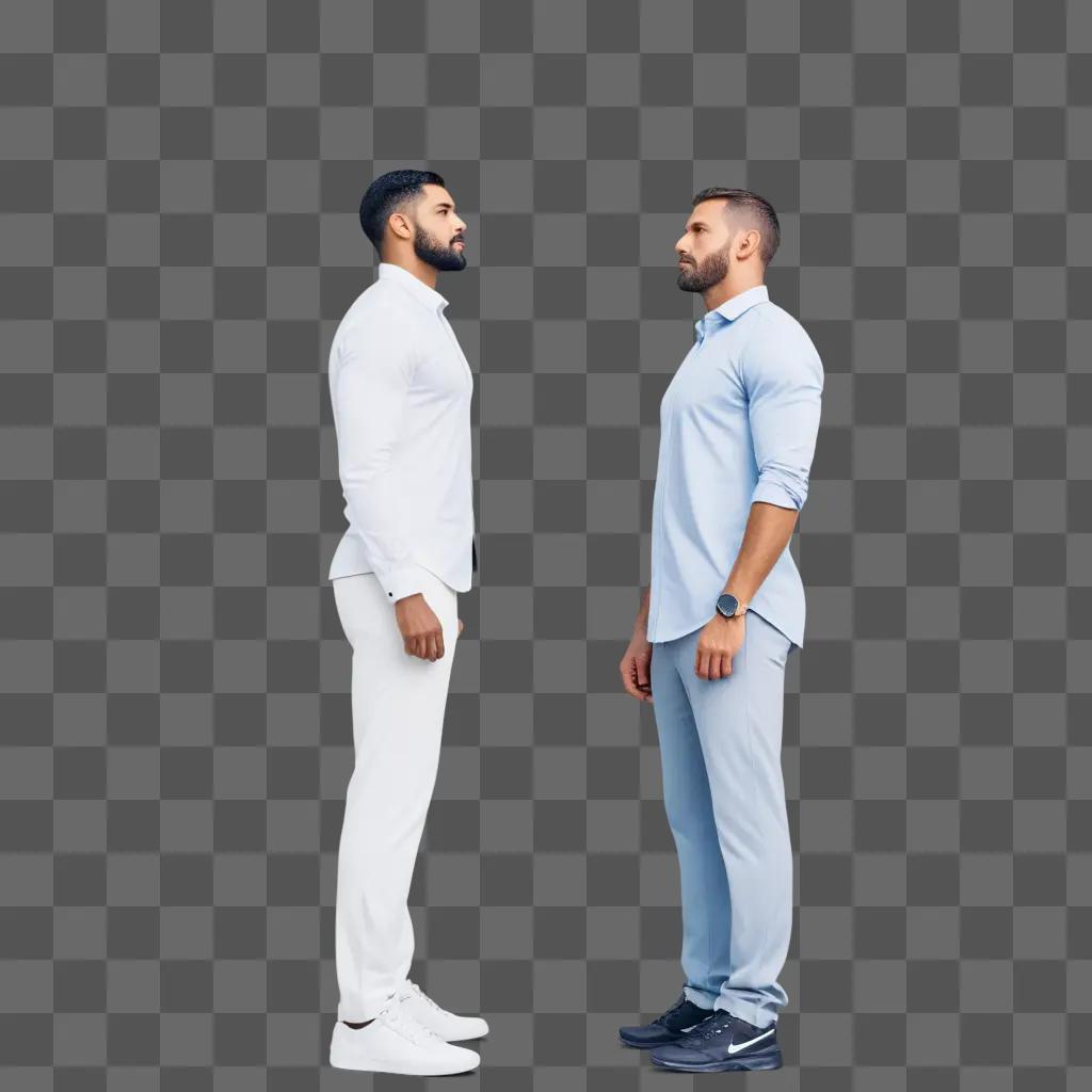 man wearing a white shirt and gray pants standing next to another man