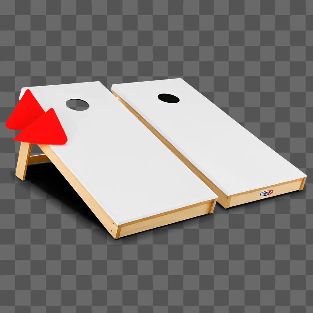 pair of Cornhole boards with a red dot on each side