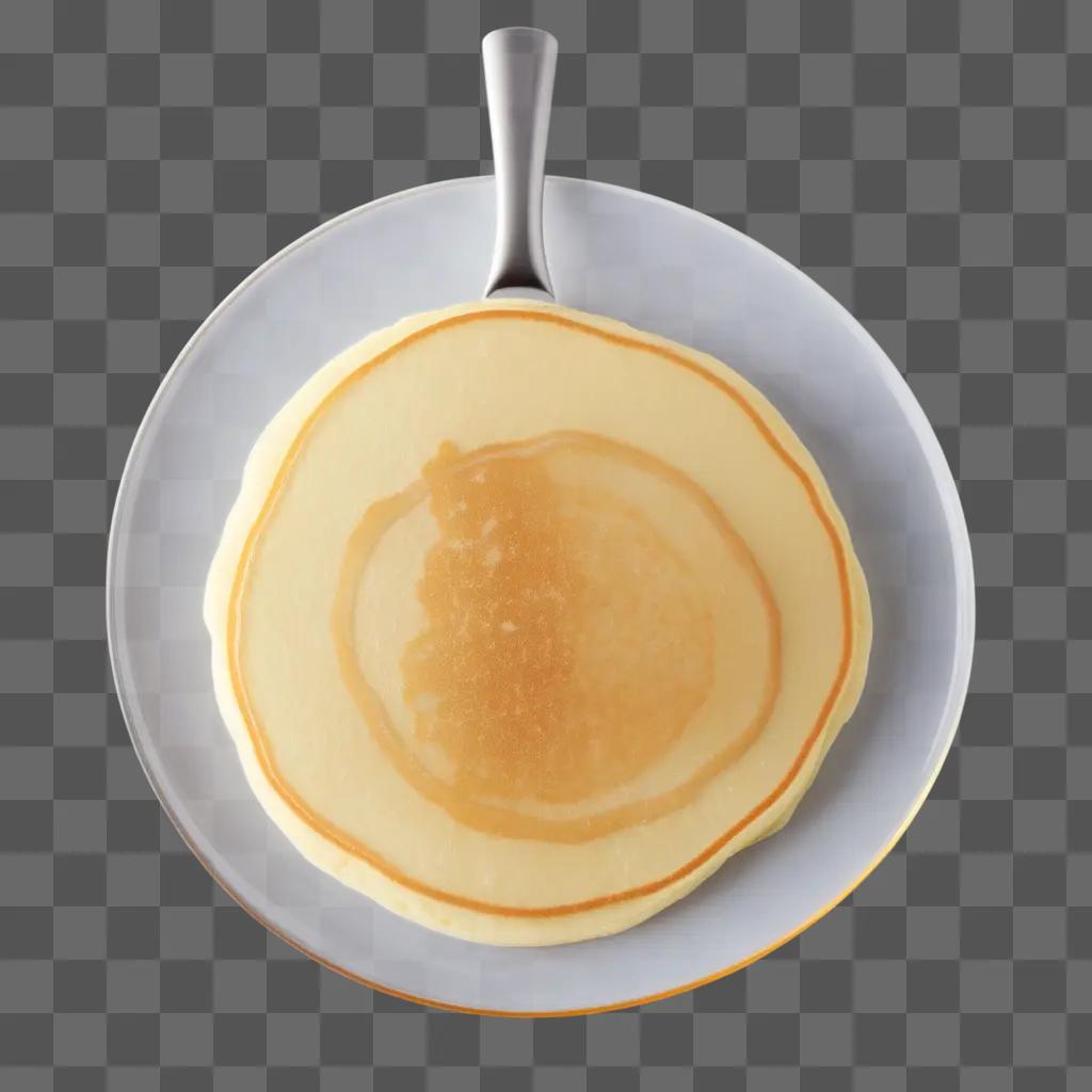 pancake on a plate with a metal spatula