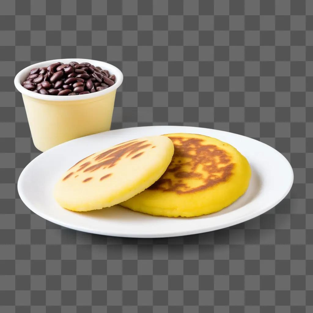 plate of arepas with beans next to them