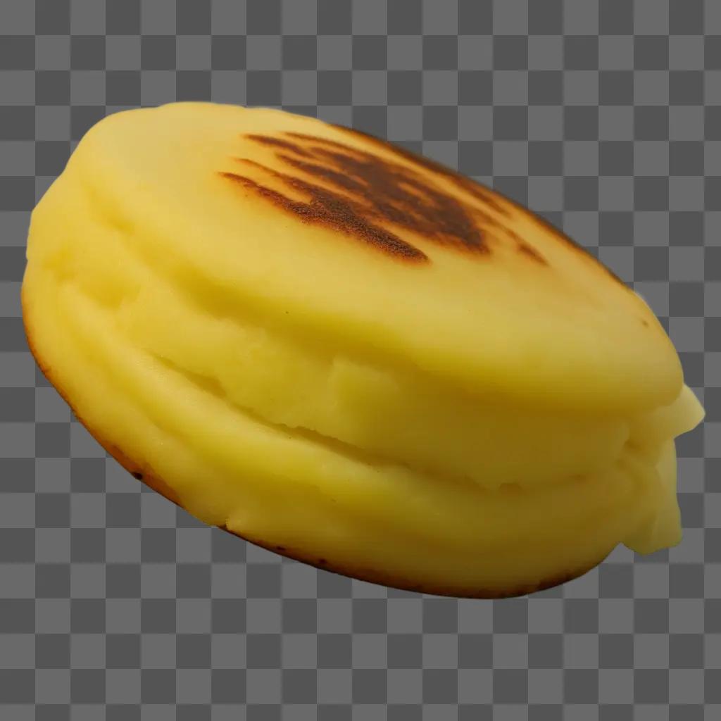 round arepa with a burnt spot