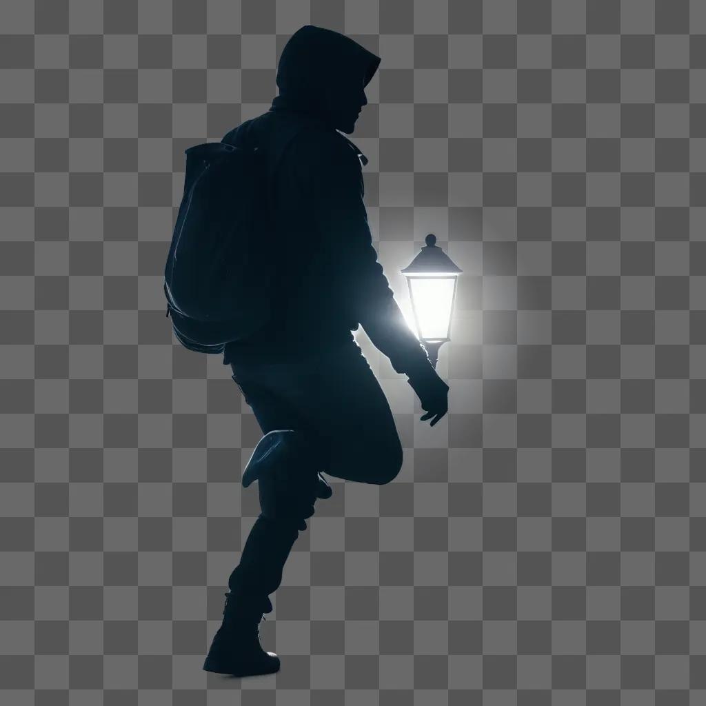 shadowy thief walks past a lit street lamp