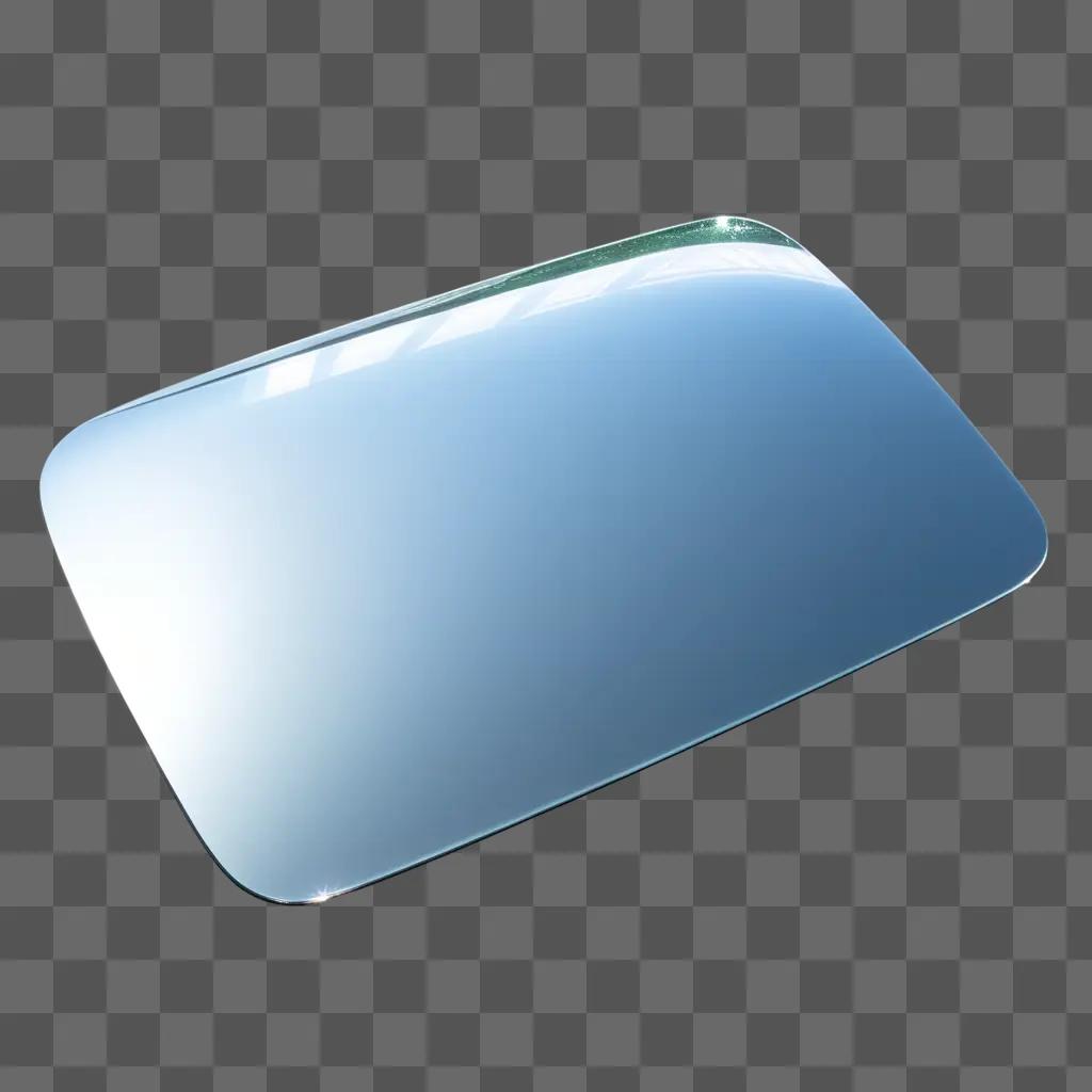 shiny transparent object sits on a blue surface