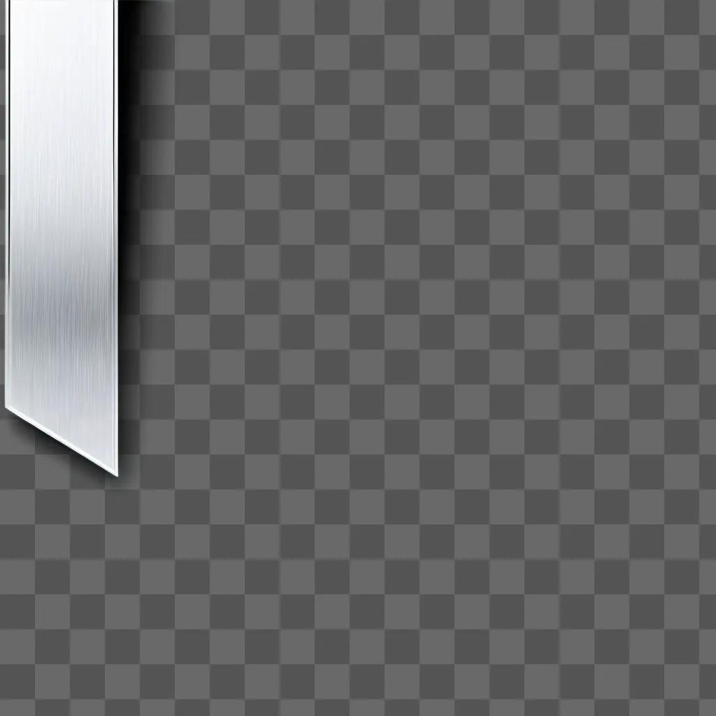 silver rectangular object against a gray background