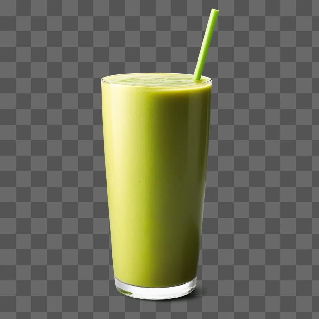 smoothie with green straw in a glass on a green background