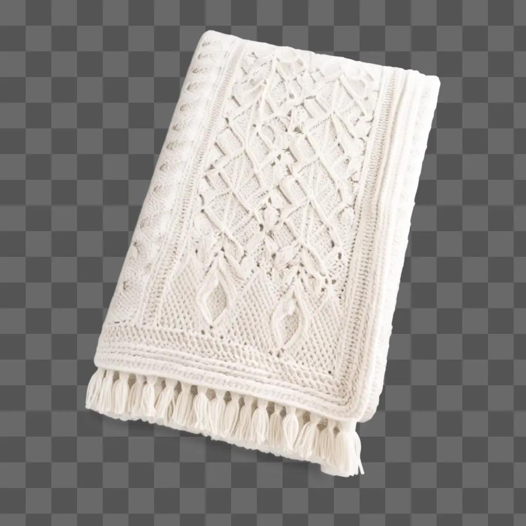 white knitted blanket on a white surface