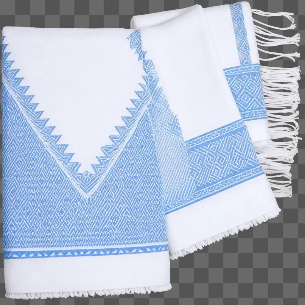 white towel with blue designs on a transparent surface