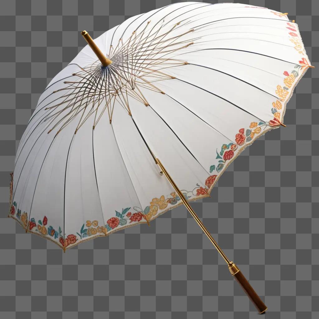 white umbrella with floral designs and a gold handle