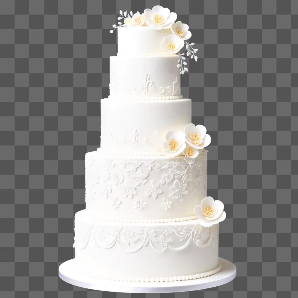 white wedding cake with flowers and designs