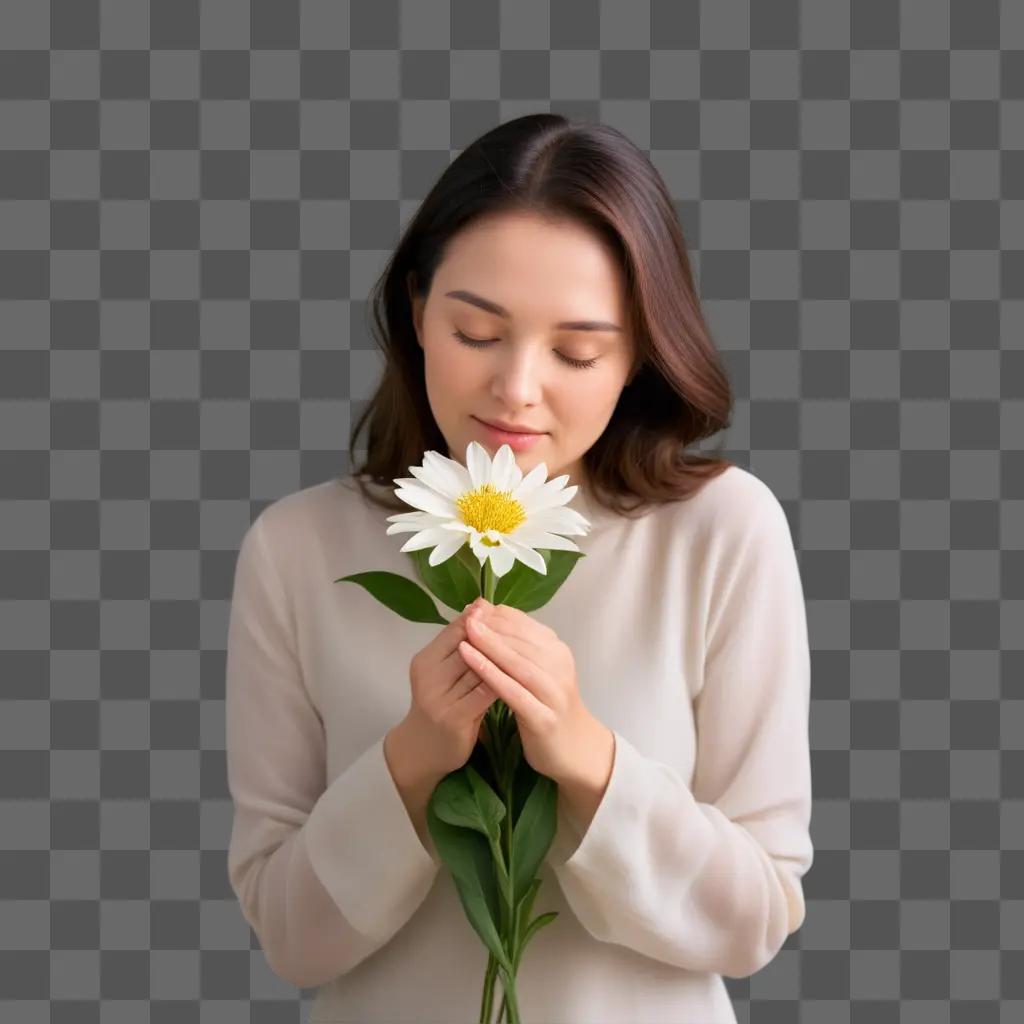 woman holding a flower in her hands