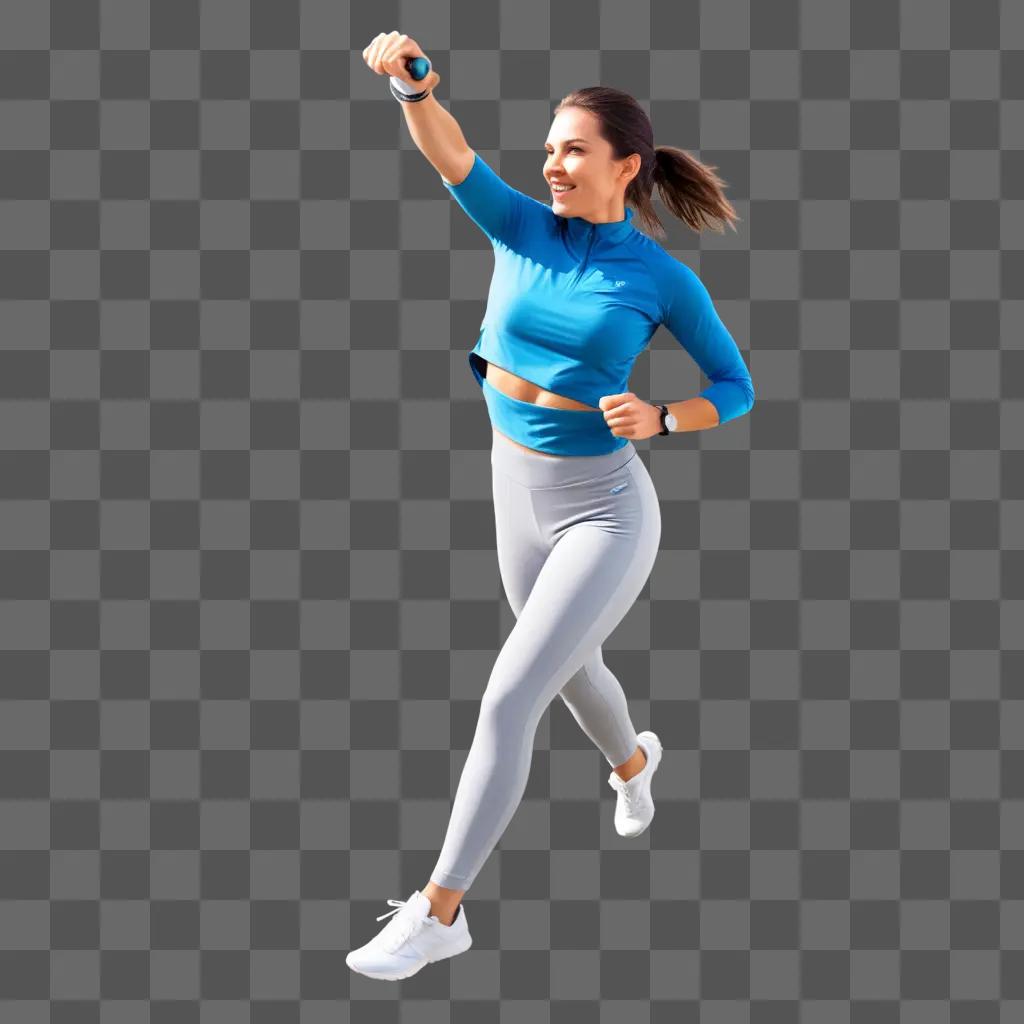 woman in a blue shirt and grey pants engages in a workout