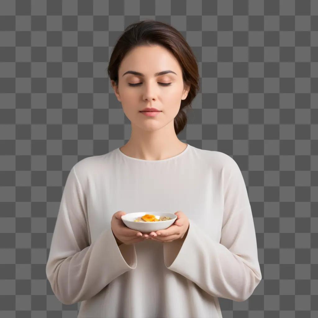 woman in a white top holding a bowl of food while fasting