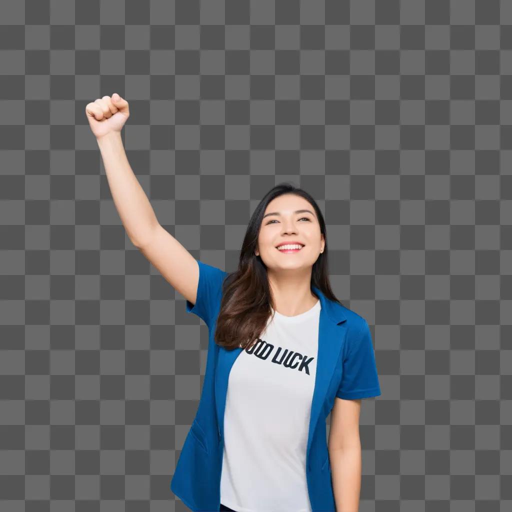 woman raises her fist and says good luck