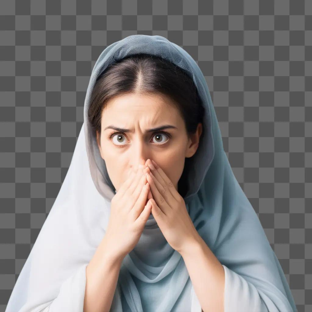 woman with her hands on her face and mouth closed