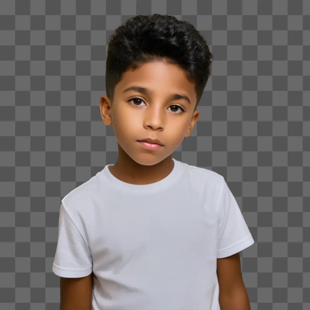 young boy wearing a white t-shirt stands in front of a gray background